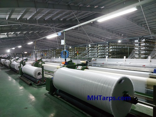 Water jet loom for weaving scrim in factory in Vietnam
